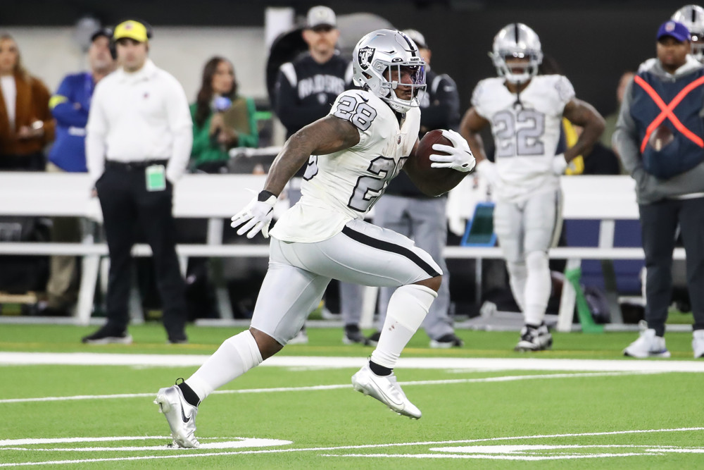 Josh Jacobs going in reverse in the Las Vegas Raiders' 38-10 loss to the  Buffalo Bills