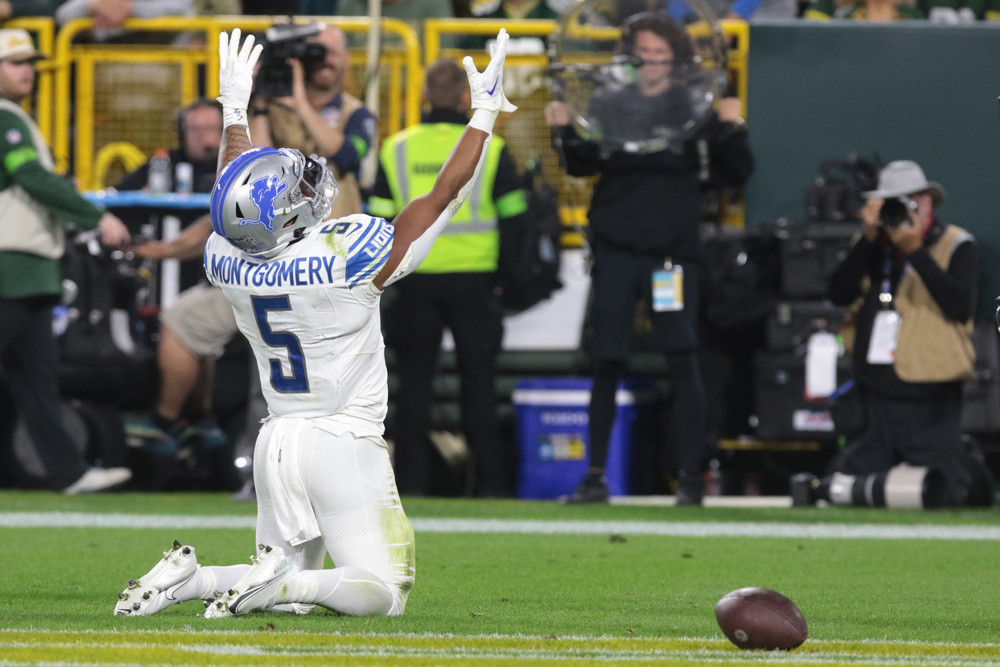 David Montgomery runs wild as Lions beat Packers 34-20 to take